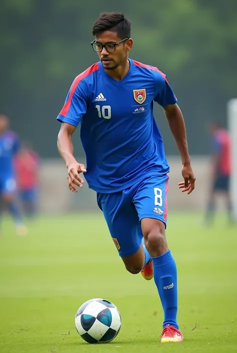 Bangladeshi, man, brown skinned, short height, wears glasses, playing soccer, blue kit.