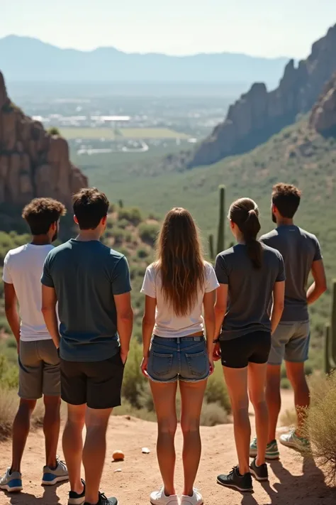 create a photo of a group of guys and girls, around college age facing away from the camera. photo should be super realistic, and a brown haired pale girl somewhere in the group facing away as well. make everyone dressed in athleisure, on top of a mountain...