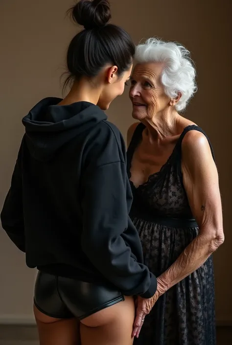 black woman hair in a bun black hoodie black leather short shorts being fucked in the ass by a old grandma in a dress
