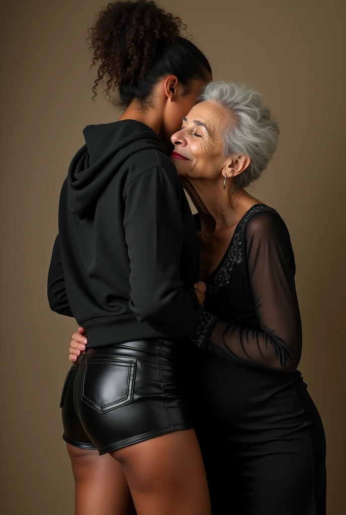 black woman hair in a bun black hoodie black leather short shorts being fucked in the ass by a old grandma in a dress
