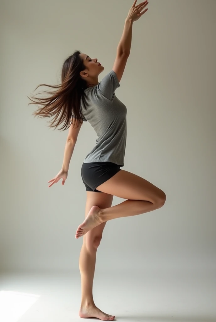 A short woman stretching in short shorts and a short t-shirt with long hair