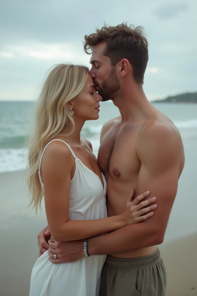 The image shows a couple in an affectionate moment outdoors, on a cloudy day
on a beach. The man stands behind the woman and gives her a tender kiss on the head. The blonde woman smiles, looking at the horizon, while holding the mans hands on her shoulders...