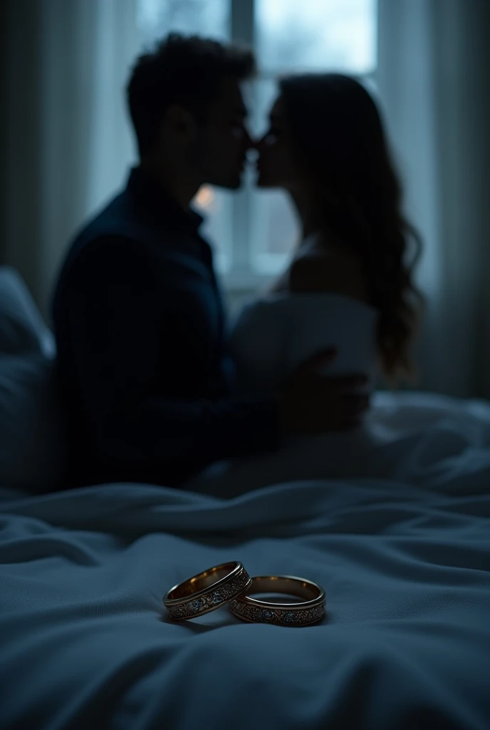 Two love rings on a bed ,  and two shadows of a man and a woman kissing in the moonlight