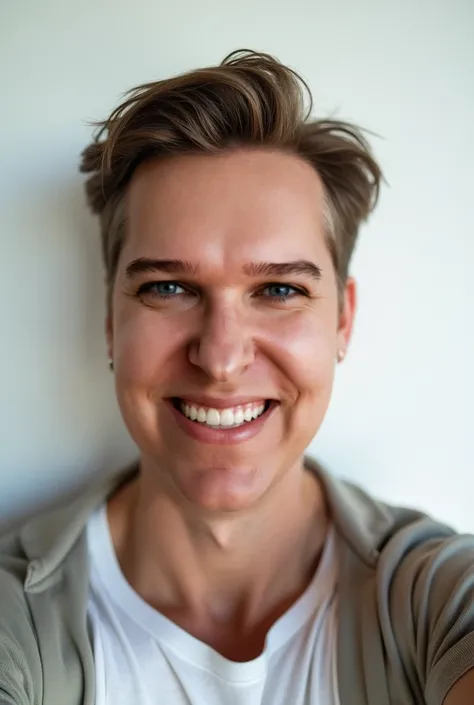  white man, beautiful, with blue eyes, smiling, Taking a selfie there is a room showing a white wall