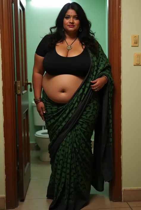 Indian extreme plus size BBW chubby fat busty dark skinned wide woman with large breast and large curvey figure and wide shoulder and long hair and wearing black deep neck tight fitting blouse with displaying cleavage and display navel and fat arm and wear...