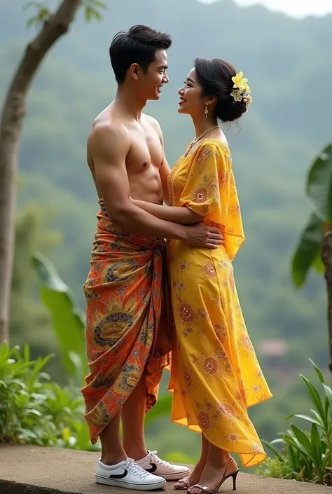 Indonesian couple standing. The handsome man wears traditional Balinese clothes, cloth trousers, sneakers, while the beautiful woman wears traditional Balinese yellow kebaya, high heels, they both smile while looking at the camera. they both stand outdoors...