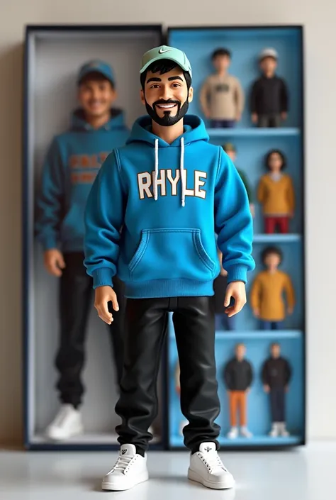 This image features a collection figure of a man wearing a blue hoodie with RHYLE written on the front, black pants, white sneakers . narrowed eyes. short black hair. This figure also wears a light green nike cap. This collection figure is positioned in fr...