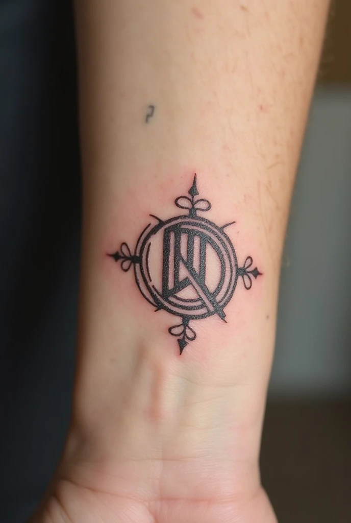 A small tattoo with Andréss combined initials, Daniel, David and Victor  