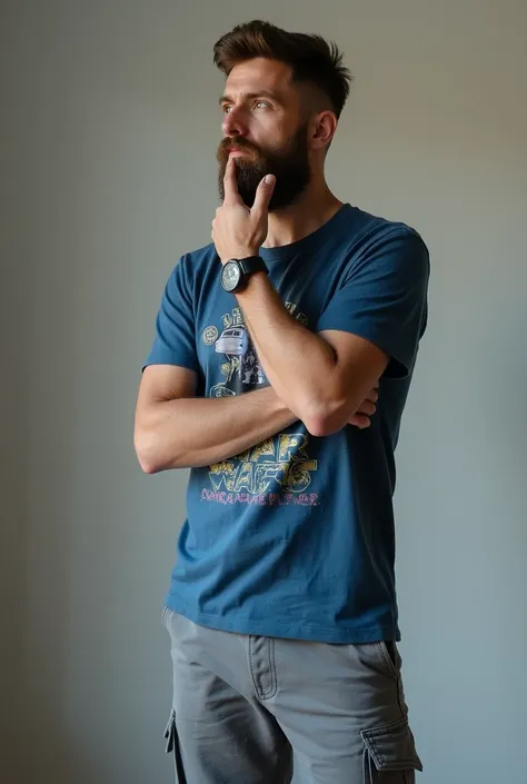  man with a brown beard wearing a blue t-shirt with a star war print with gins pants and white shoes he is sitting in profile view but his face is looking at the camera at an angle of 3/4 He also finds himself extending his right to the front with his palm...