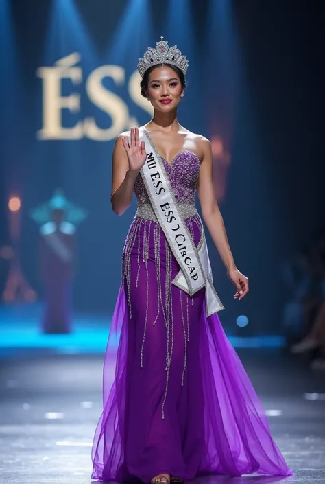 a beautiful woman from Indonesia.smiles.becomes miss universe.her hair is neatly tied in a bun. wearing a long bright purple dress with a combination of silver and a motif of a peacock spreading its feathers. wearing a crown. wearing a sling ribbon that sa...