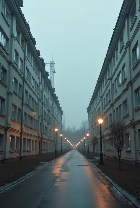 Nowadays in Russia there are gray panel houses with a road with Soviet lampposts