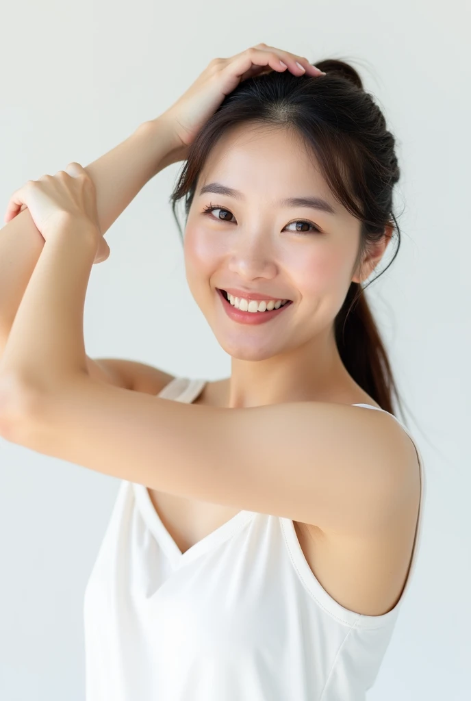 A photograph of the beautiful Korean Women smiling and raising her arm to showcase the effects of her skin care routine. The image features a white background, a half-length shot, and a white sleeveless top. The photography was done in a studio setting, ut...