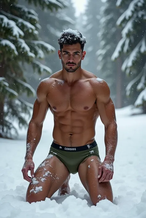  The image shows a young Latino man , velludo,  shirtless , with a muscular physique, kneeling in the snow .  He is wearing a tight military green thong and seems to be outdoors in a snow-covered wooded area,  surrounded by evergreen trees . Snow covers pa...