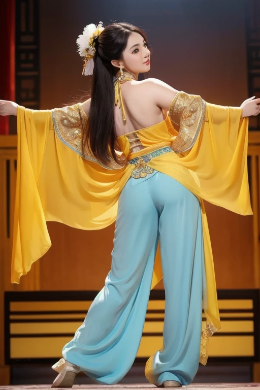 The woman is wearing an ancient dance costume, including a yellow full-length halter top blouse, and light blue chiffon trousers on the bottom. She is an oriental beauty with a very Chinese style. The costume is very Song Dynasty style. She has her back to...