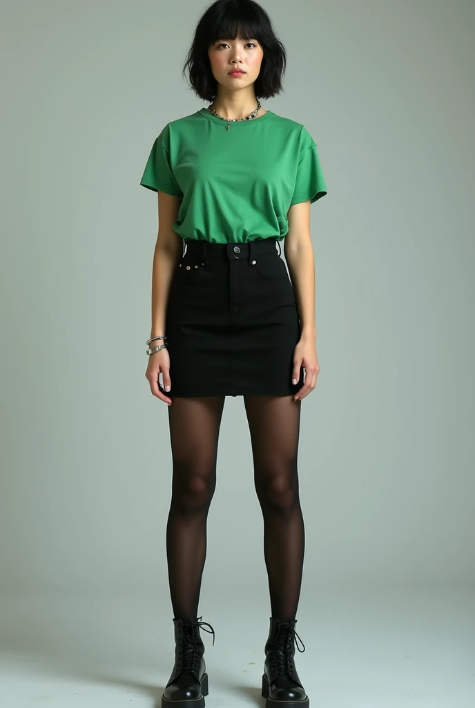 22 year old Caucasian girl with short black hair positing for a full body photo in a green top, black mini skirt, and black sheer tights