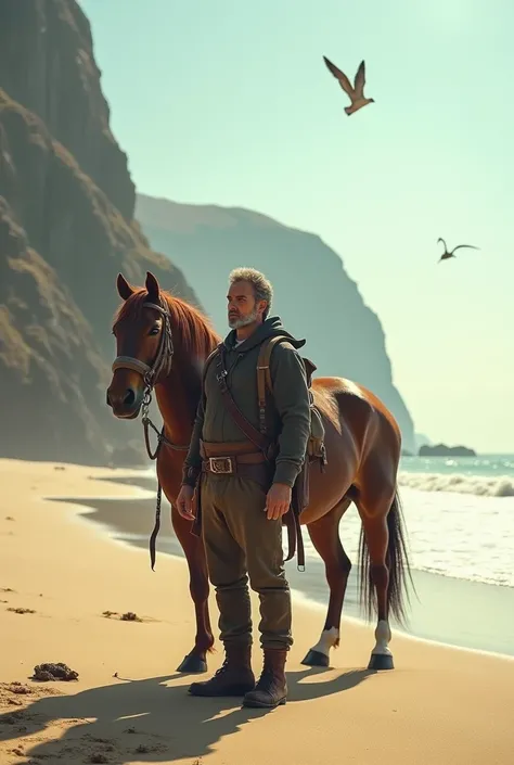 A man stands on a beach with his horse next to him