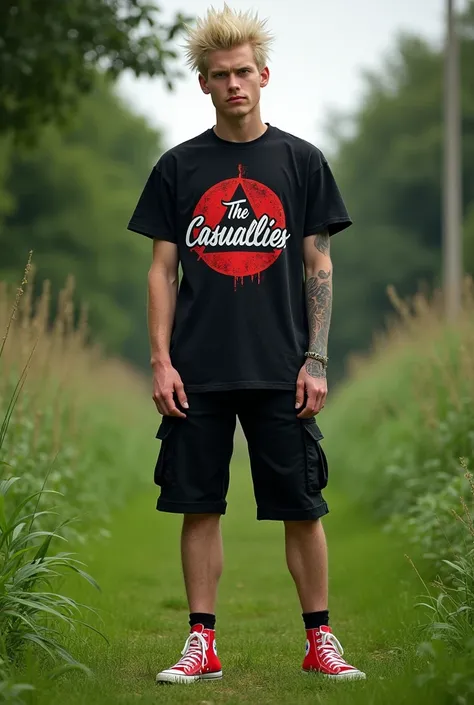 30 year old england man with libertyspikes punk blonde hair, wearing a black t-shirt with a picture of the band The Casualties, wearing black cargo shorts, wearing red Converse shoes, posing standing on green grass, colored tones.