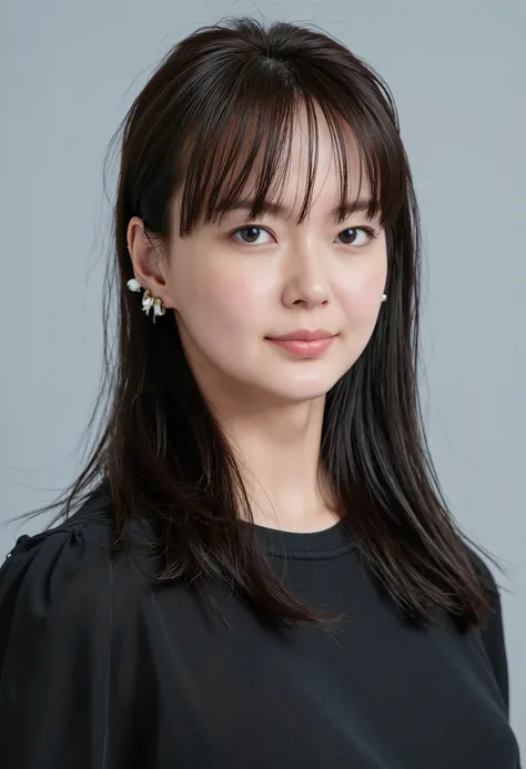young Japanese woman、 tabe mikako、black hair、 ear piercing、 smile、 beautiful alignment of teeth、 black down jacket、Gray background、 front angle