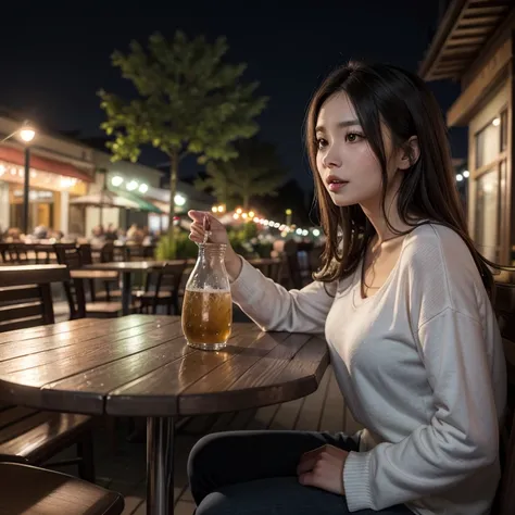 A beautiful woman talking to a robin bird on outdoor restaurant table.