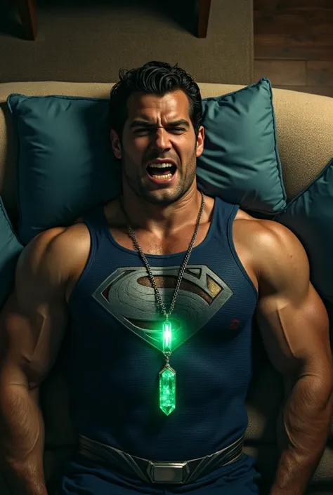 h3nr4, muscular, tanned skin, strong physique Muscular man radiates confidence and power. wearing a blue Superman costume, lies on a sofa at home, pained facial expression, almost unconscious, orgasm face, eyes closed, mouth open, a glowing emerald green c...