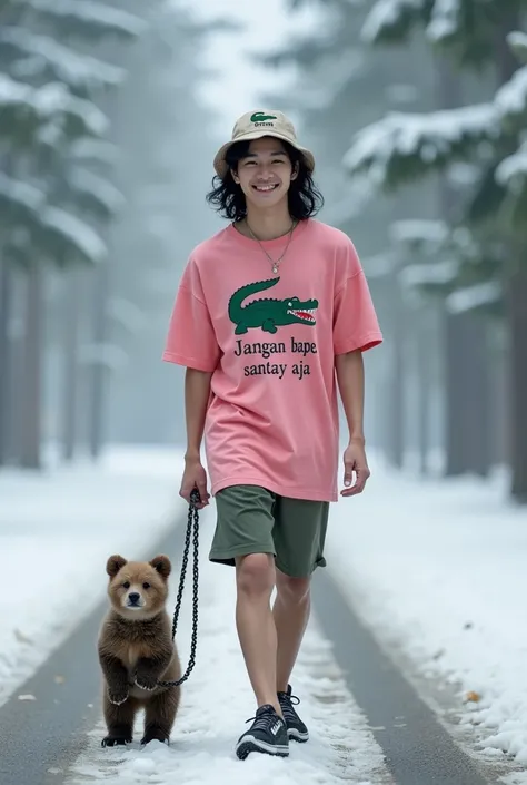 A handsome Korean man with long, curly hair smiling, a bucket hat with a crocodile image, wearing a pink t-shirt with "Jangan baper santay aja" written on it, shorts, carrying a bear cub on a chain, walking in the middle of a snowy road, on the right and l...