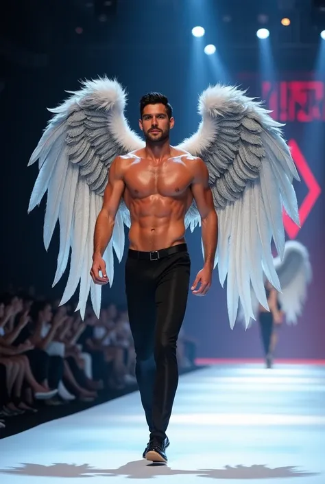 A Victorias Secret male model is on the catwalk，With wings on his back