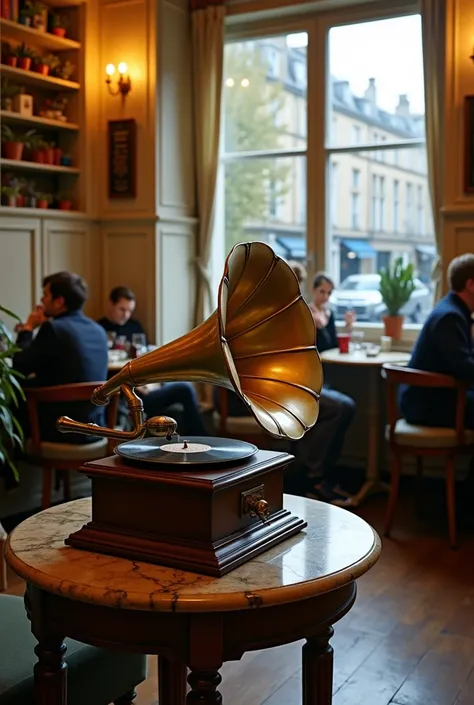  Un Vintage gramophone in shades of gold and dark wood rests on a small marble table in a cozy Parisian cafe.  The metallic horn shines slightly under the soft warm light of the ceiling lamps ,  while a black disc rotates slowly on its platform . The café ...