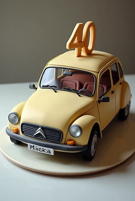 Birthday cake in the shape of a Citroën saxo with 40 years and Micka written on the roof