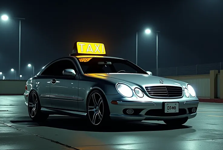 Sideshot of One single Silver 2000s mercedes cls with a bright taxi sign standing in a parking lot in the night under bright street lantern spotlight, front car sign Says „DU-MB 6767“