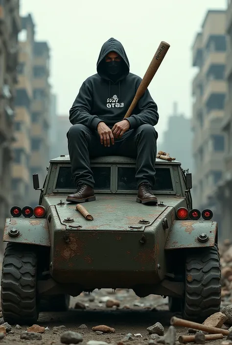  A man wearing a black Hoodie sweater and a mask carries a baseball bat,
 was sitting on top of a mangled steel tank war car , background of destroyed buildings 
THERE IS A LOGO OF THE NAME BANG AZAY ON THE BLACK HOODIE SWEATER  