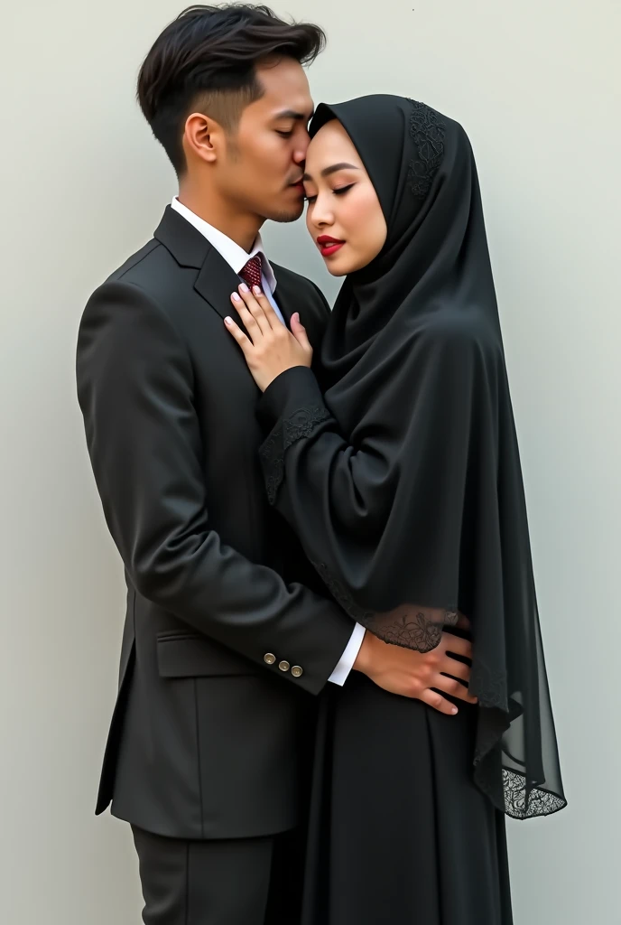 Portrait of Indonesian Couple, Man in Jacket, Girl Wearing Abaya Dress Islamic Muslim Woman Plain Black Long Sleeve Plain Elegant Lacy Connected Hijab, White Wall Behind Her, Man Carrying Girl Bridal Style

