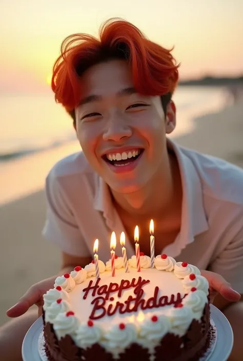 Real photo of a handsome Korean faced man wearing a hodie black color red hair hafap camera today brings a great birthday cake writing "dhe mozzart happy birthday "  lit candles looking like his body seemed to fall with his cake and his body fell smiling o...