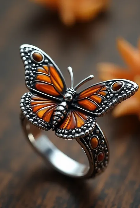  Silver ring with a monarch butterfly, with tigers eye stone details 
