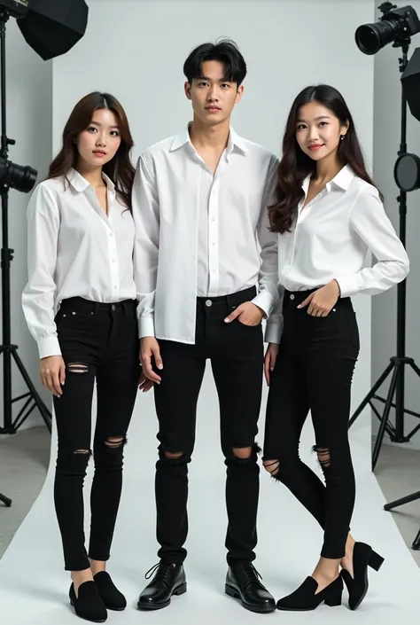 Photo 4 Koreans 2 girls and 1 guy in the middle again sitting in the photo studio many cameras wearing white shirts and long black jeans ripped knee thin black shoes 