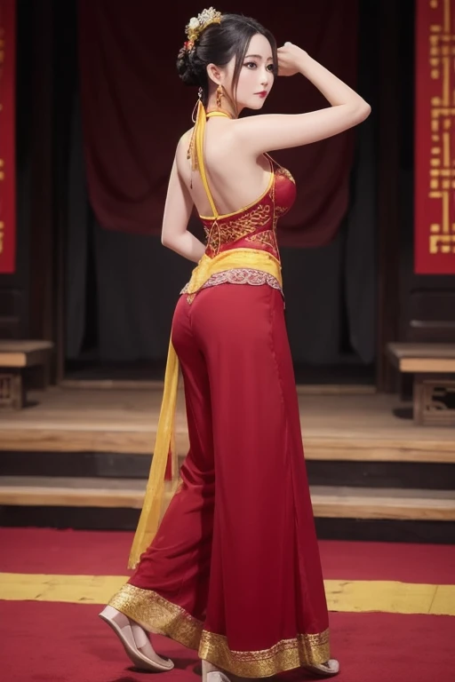 The woman is wearing a maroon red and yellow ancient dance costume, including a full-length halter top blouse, and chiffon trousers on the bottom. She is an oriental beauty with a very Chinese style. The costume is very Song Dynasty style. She has her back...