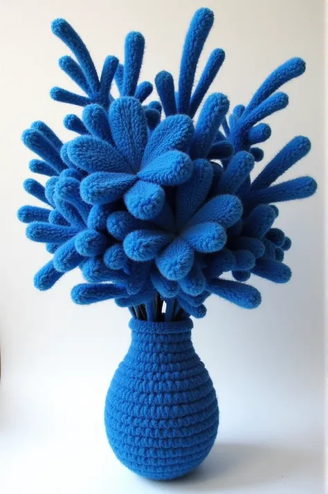 A vase of flowers made of chenille stem with dark blue colour
