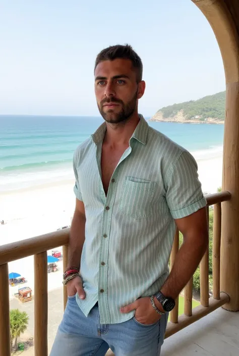 "A young man stands confidently on a wood balcony with a view to the white sand beach, smiling as he looks off to the side. The mans shirt is a lightweight, short-sleeved button-up with a relaxed fit, perfect for warm weather. It features thin vertical str...