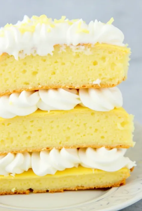 🍋🍰  Unbaked Lemon Eclair Cake

Ingredients :
 - 1 pack of vanilla cookies!
- 2 cups of cold milk
- 1 box of vanilla pudding mix
- 1 cup of whipped cream
- 1/ 4 cup of lemon juice
- Lemon Zest  (to decorate)

 Instructions :
1.  In a bowl ,  mix the pudding...