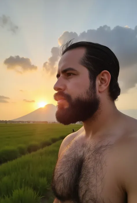  Portrait of a 20-years-old man,  muscular and bare-chested  ,   with a beard and well-kept dark hair  ,   of a sturdy and manly appearance  .   He is in an open field with green grass at dusk  ,   as the sun sets on the horizon with an erupting volcano in...