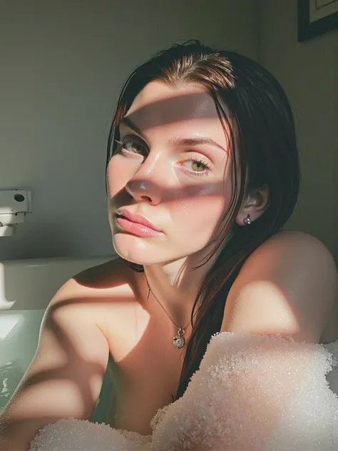 carlycoplin. The photograph captures a young woman in a bathtub, her head and shoulders submerged in a frothy layer of bubbles. She has a fair complexion and long, wet, auburn hair that clings to her shoulders. Her eyes are a striking hazel color, and she ...