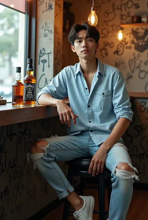  featuring Poto landscape a handsome Korean man 20 years old is sitting on a stool bar chair.  the man is wearing a light blue box shirt jeans ripped Nike shoes . visible on the table there is a bottle of the Jack Daniels and guitar .wall background full o...