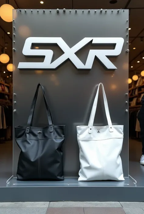 SXR shop front view advertising photo Totebag bag showcases display decoration in front of store with silver grey transparent acrylic sheet with elegant SXR logo, steel rivets, 1 black and 1 white bag, size 14 by 16 inches, long hanging, showing off the SX...