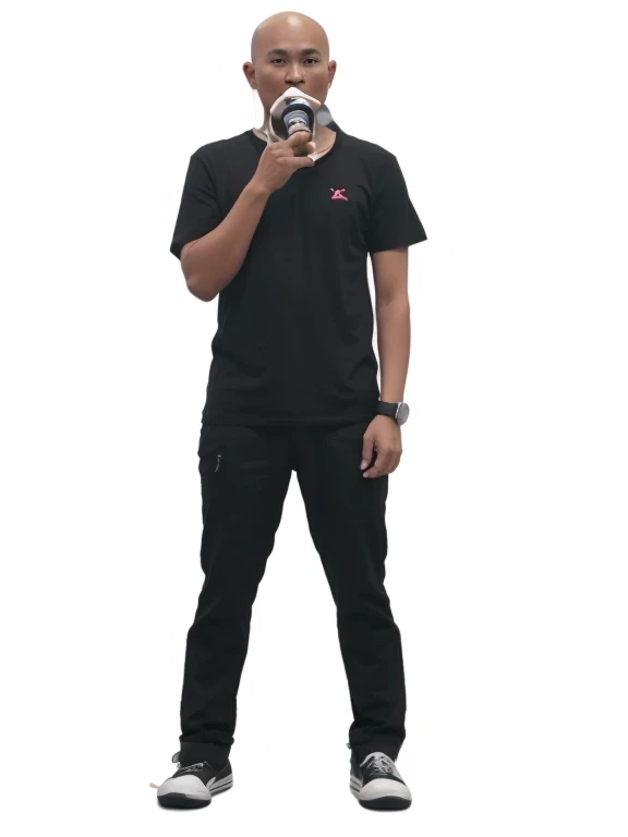 An Indonesian man, bald, wearing a black t-shirt and black pants, holding a horn speaker, wearing black and white shoes. 