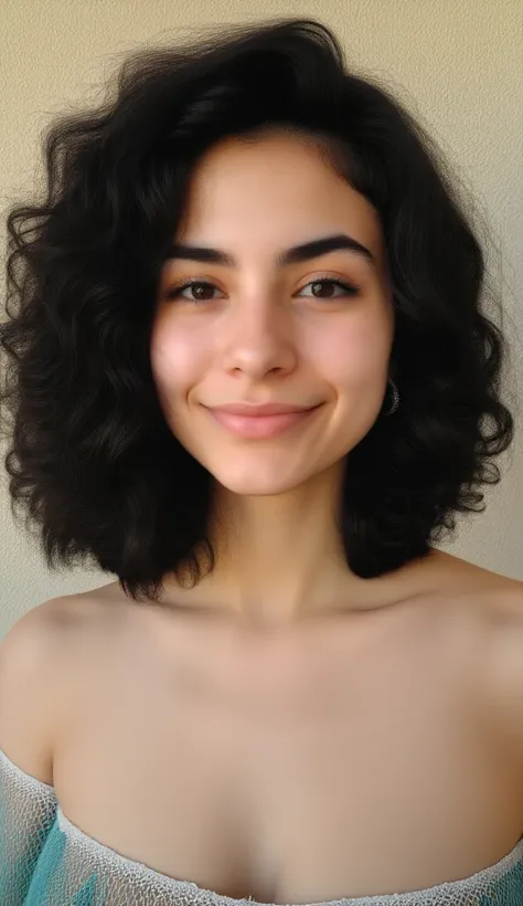 A close up of a woman in a dress smiling at the camera