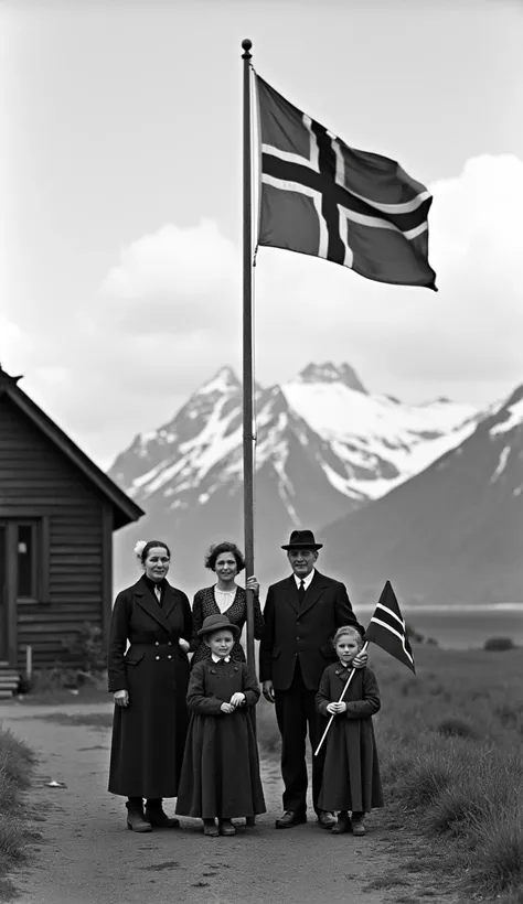 Black and white photograph depicting a rural scene with a family of four standing in front of a traditional wooden house. The house is dark with a white trim and a steep roof, typical of early 20th-century architecture. In the background, snow-capped mount...