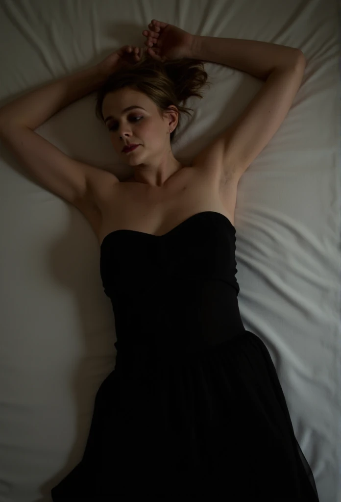 Carey Mulligan, picture from above, lying limp on a bed on back, black strapless dress , drunk face, arms up