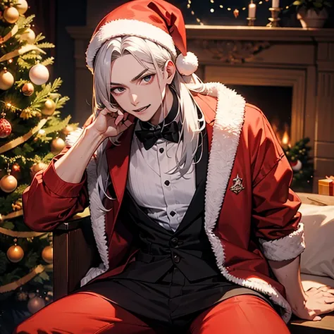  A vampire guy with long hair half black, half white ,  sits next to a Christmas tree 