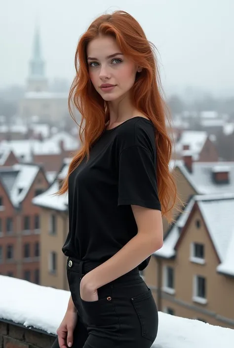 Beautiful Russian girl in a black ordinary loose t-shirt on the roof of houses in winter in a stylish straight pose 
