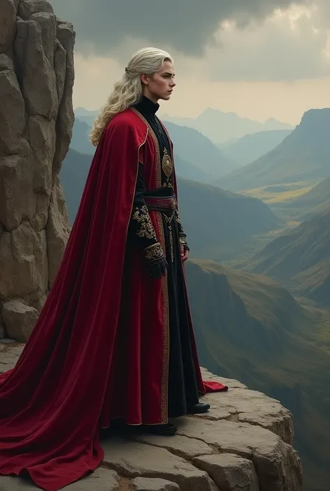 Rhaegar Targaryen on a cliff wearing flowing black and red clothes looking at the view.