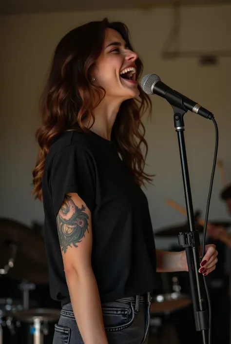 High definition image 20-year-old brunette woman has a tattoo on her arm daytime image she wears a simple black t-shirt large and loose pants black jeans light and shade on her clothes she has friends having fun singing angry with microphone in her hand th...